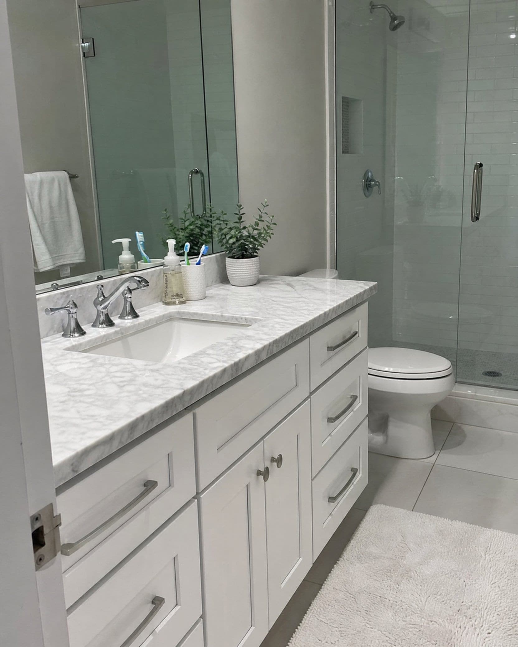 A spotless bathroom vanity after a NovaSpark cleaning