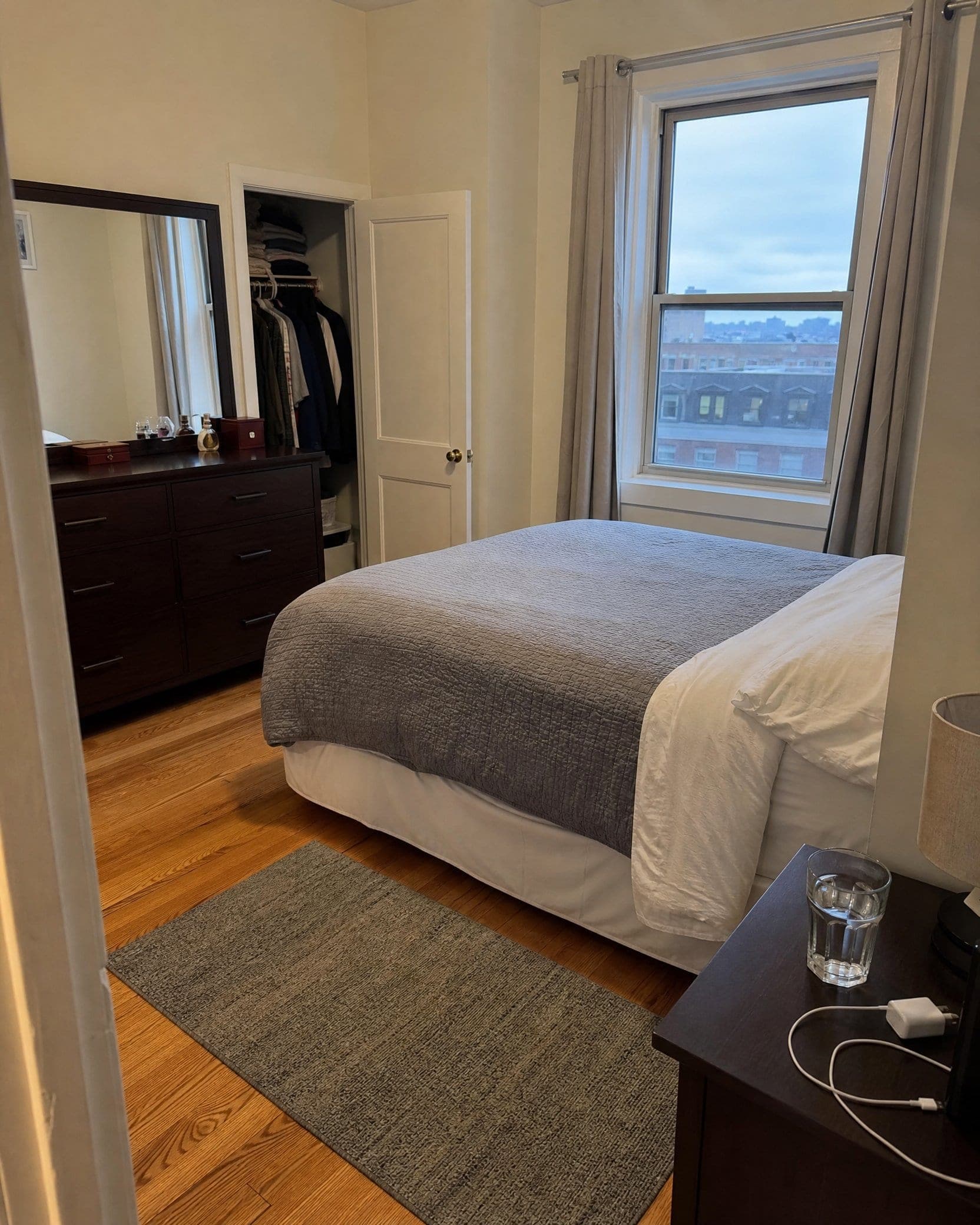 A tidy, freshly cleaned bedroom in a NovaSpark client's home